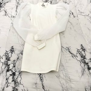 White body con dress with tulle sleeve